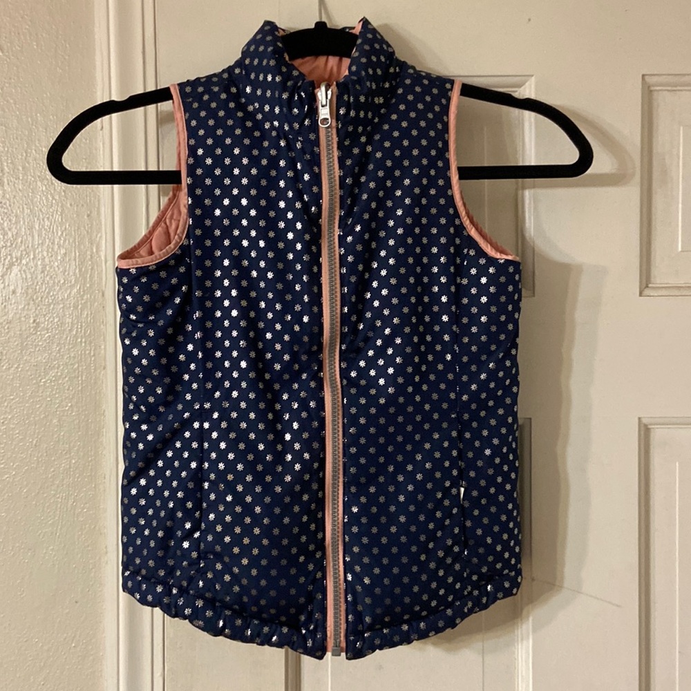 Little girl’s reversible puffer vest